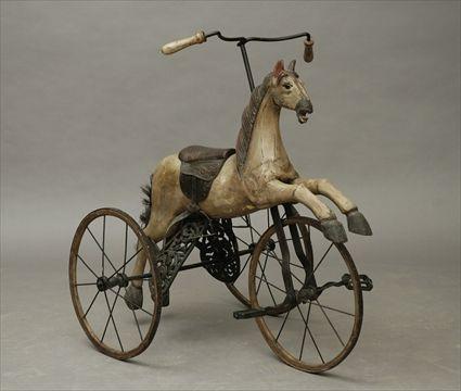 Appraisal: Victorian Tricycle with Carved and Painted Horse Figure x x