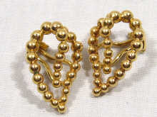 Appraisal: A pair of carat gold clip earrings weighing grams circa