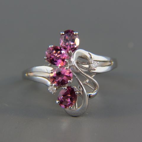 Appraisal: Pink Tourmaline Diamond Ring few gems highlighted by diamonds total