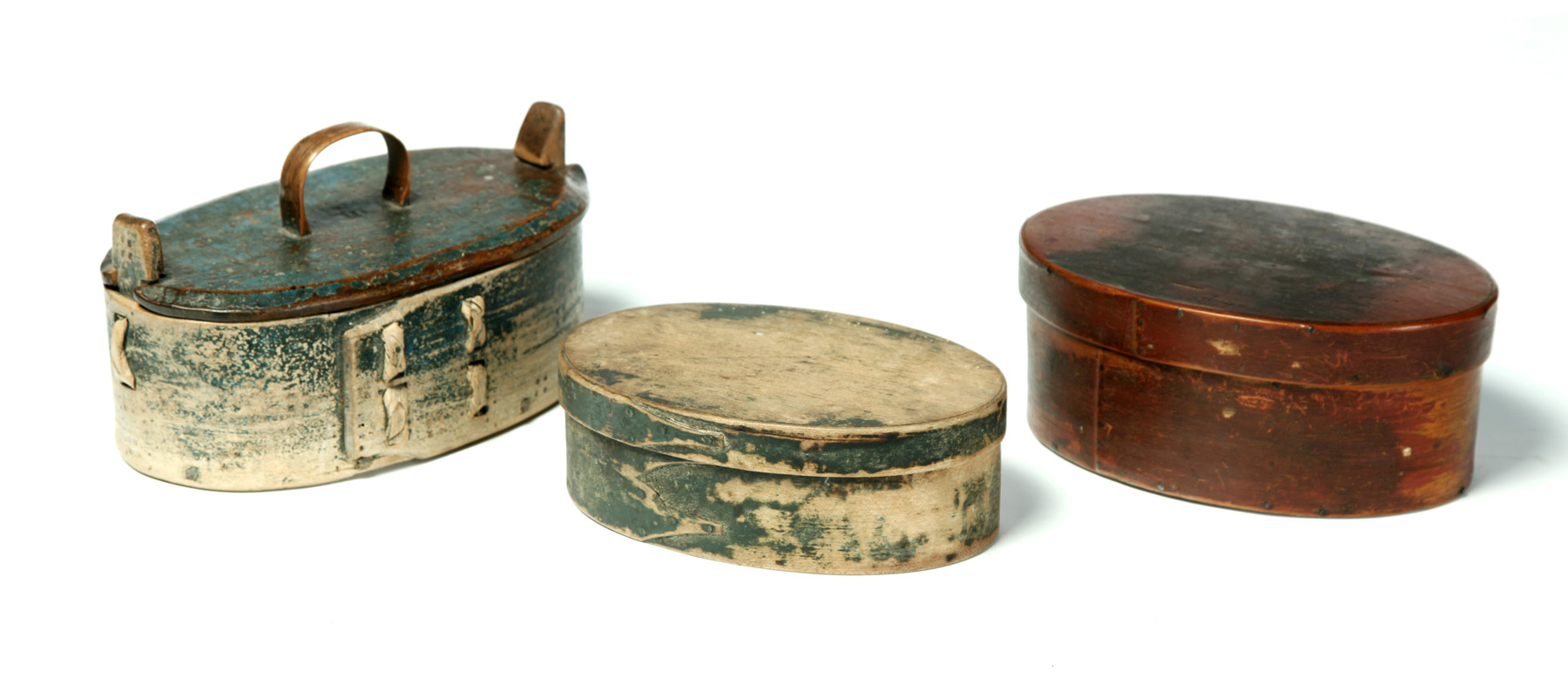 Appraisal: THREE OVAL PANTRY BOXES American and European th century Original