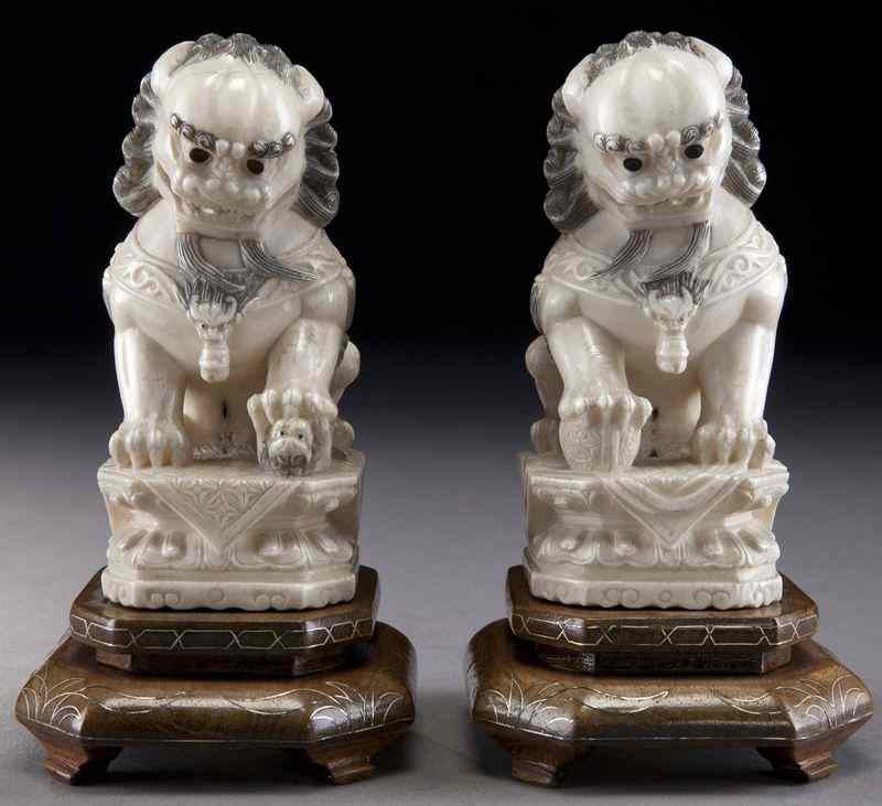 Appraisal: Pr Chinese carved ivory foo dogs International buyers should note