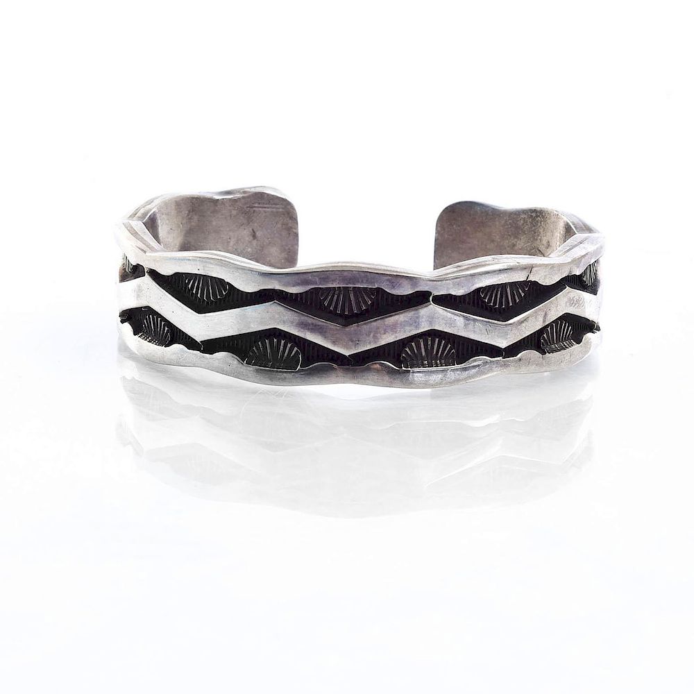 Appraisal: OVERLAY CHISELED NAVAJO STERLING SILVER BRACELET Cuff bracelet with chiseled