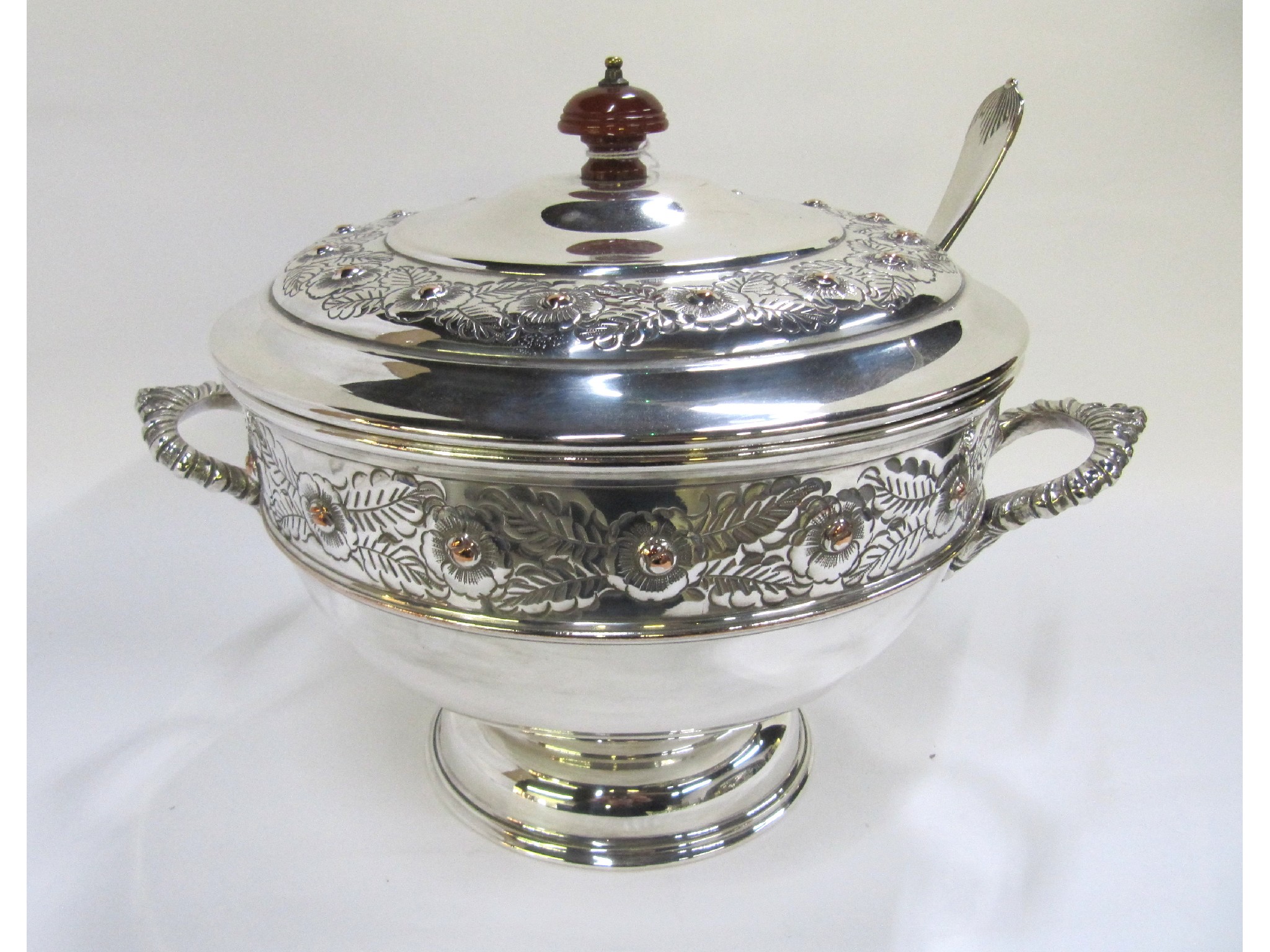 Appraisal: A silver plated soup tureen with ladle