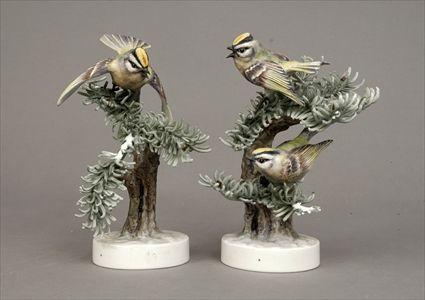 Appraisal: Two Royal Worcester Polychrome Biscuit Porcelain Bird Figures x in