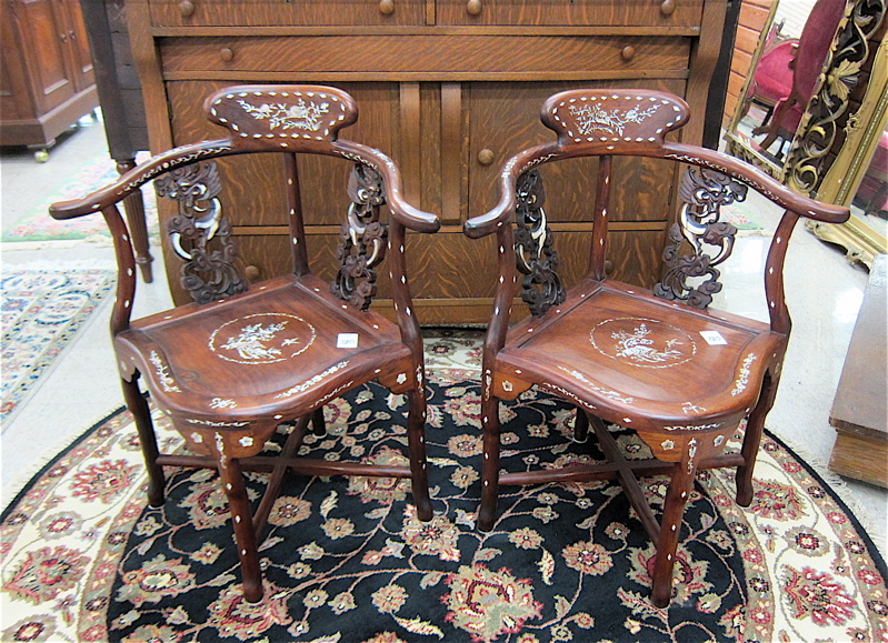 Appraisal: PAIR MING-STYLE CARVED AND INLAID CORNER ARMCHAIRS Chinese th century