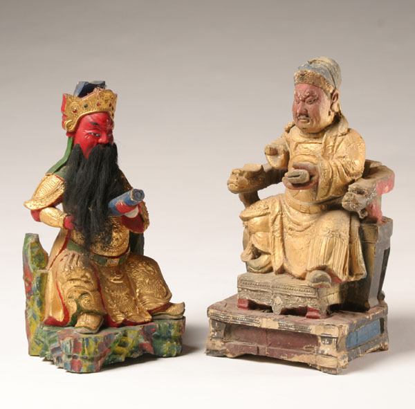 Appraisal: Carved wooden Chinese temple figures both with paint and gilt