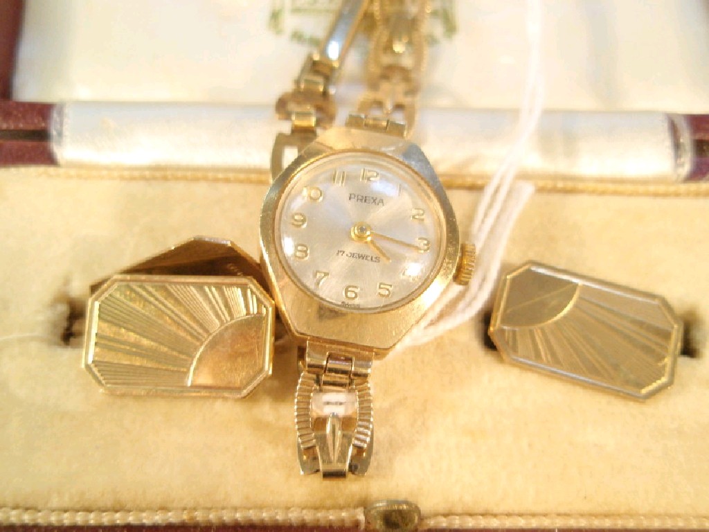 Appraisal: A ladies Prexa ct gold bracelet wristwatch together with a