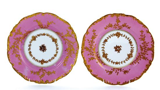 Appraisal: French porcelain plates Tressemann Vogt circa rococo pattern with scalloped