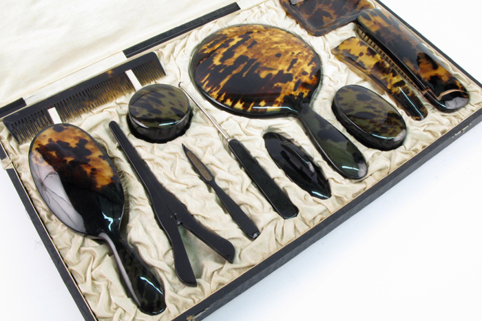 Appraisal: A VICTORIAN TORTOISE-SHELL PIECE VANITY DRESSING SET in a satin