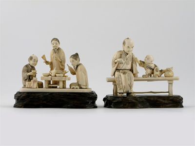 Appraisal: Two Japanese ivory carvings one of three figures sitting down