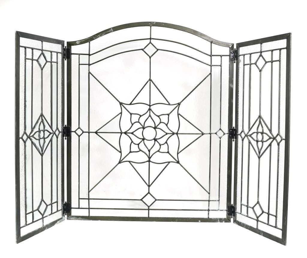 Appraisal: A leaded clear glass three panel fire screen with central