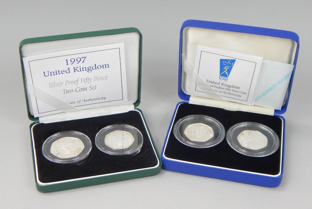 Appraisal: Various cased Royal Mint coin sets comprising a pence two