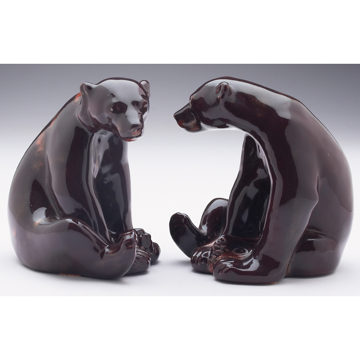 Appraisal: Rookwood paperweights two contemporary bears covered in a brown crystalline