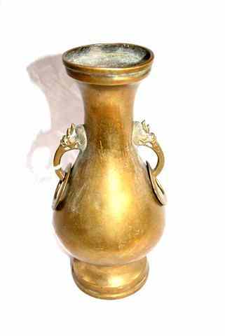 Appraisal: A CHINESE ANTIQUE BRASS ALTAR VASE OF BALUSTER FORM -