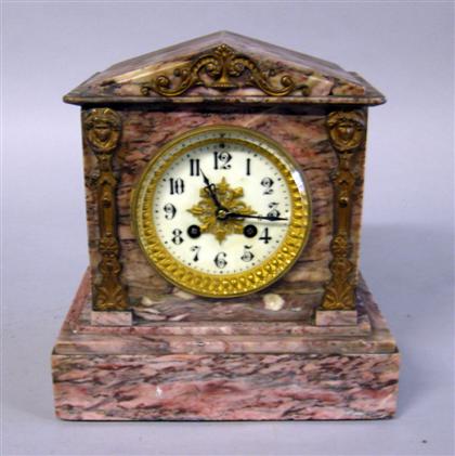 Appraisal: French pink marble and gilt metal mounted mantle clock retailed