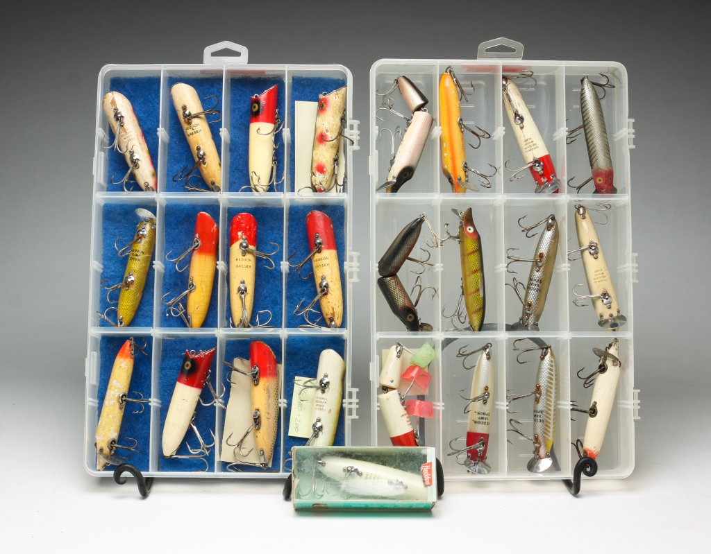 Appraisal: TWENTY-FOUR HEDDON LURES INCLUDING WOOD American th century Including Bassers