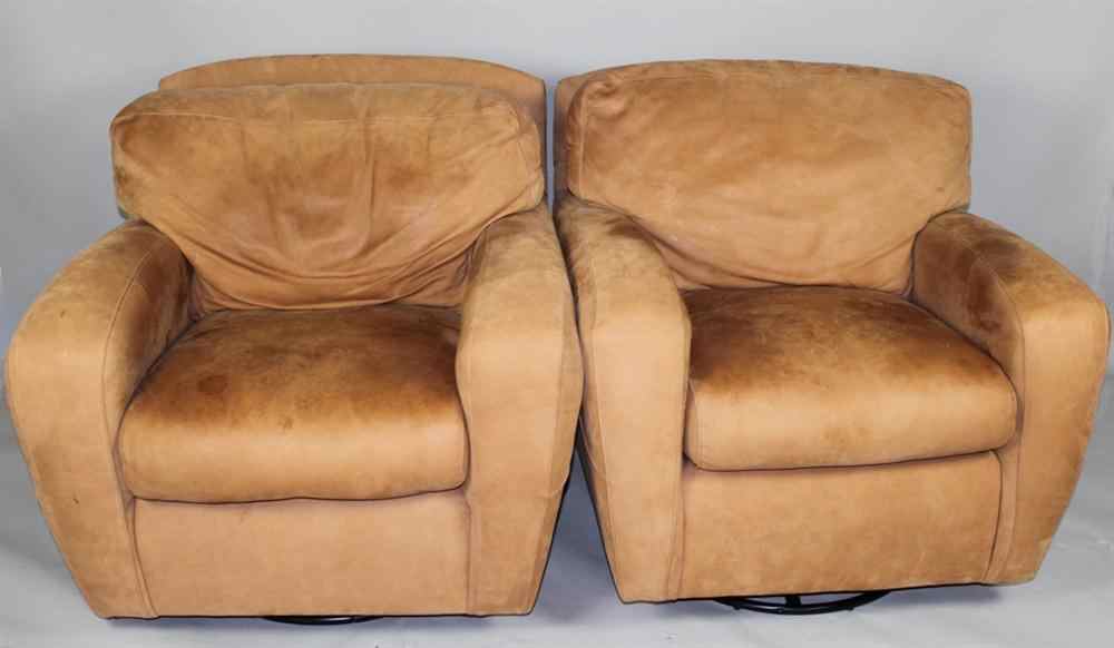 Appraisal: PAIR OF CIBOLA ROCKING LEATHER ARMCHAIRS Supple honey colored leather