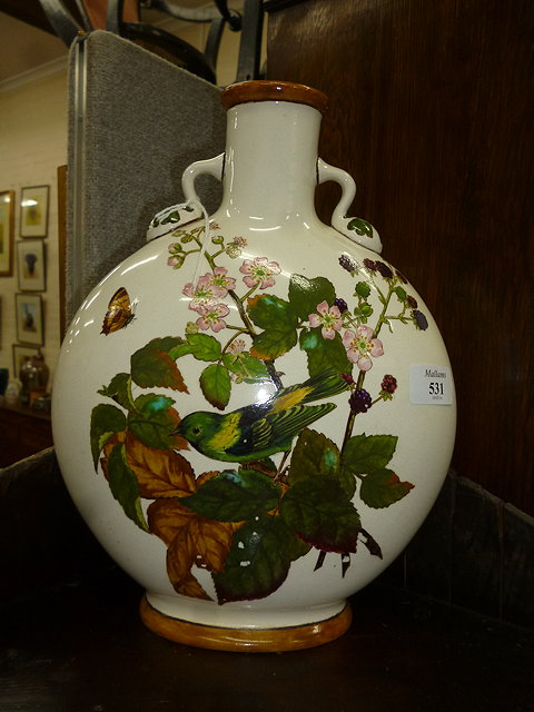 Appraisal: A VICTORIAN ART POTTERY MOON FLASK hand painted in coloured