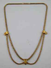 Appraisal: A yellow metal tests ct gold snake link necklace with