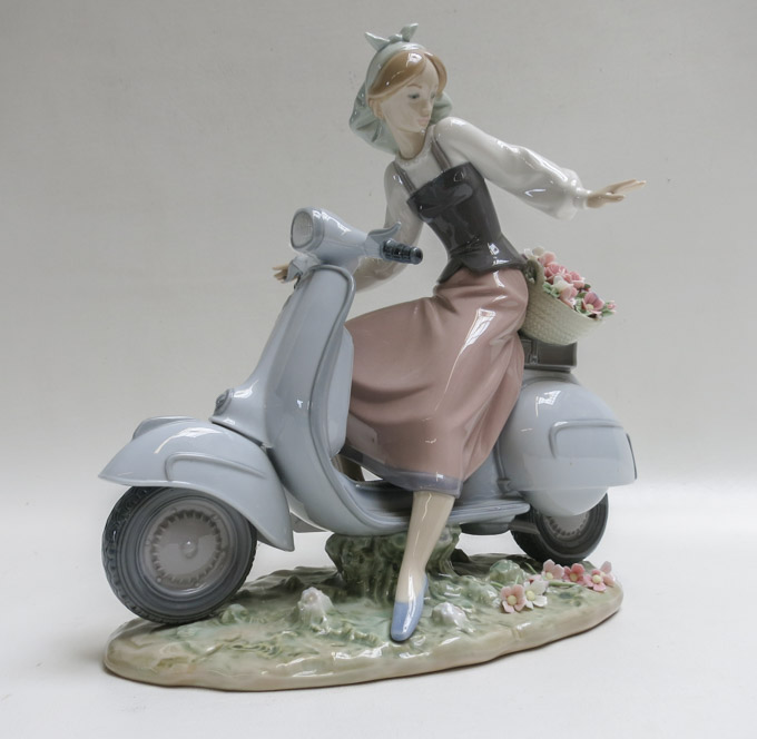 Appraisal: LLADRO PORCELAIN COUNTRY GIRL WITH MOTORCYCLE FIGURINE Juan Huerta sculptor