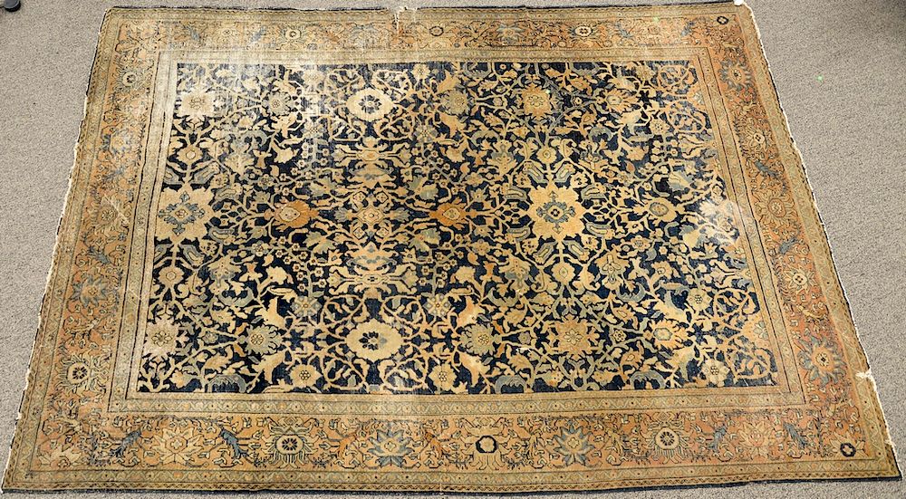 Appraisal: Oushak Oriental carpet worn in tear at border ' x