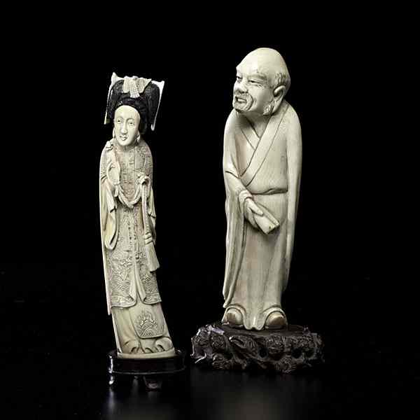 Appraisal: Chinese Ivory Figures Chinese th century Two carved and inked