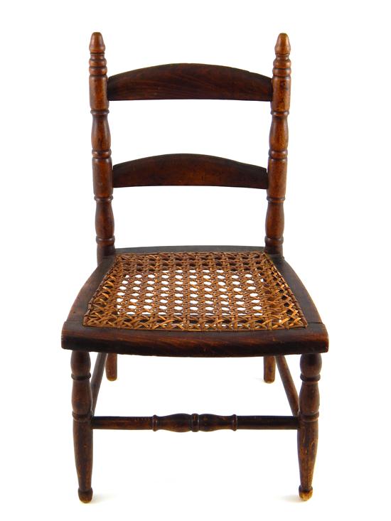 Appraisal: Diminutive child's side chair with cane-woven seat acorn ears finely