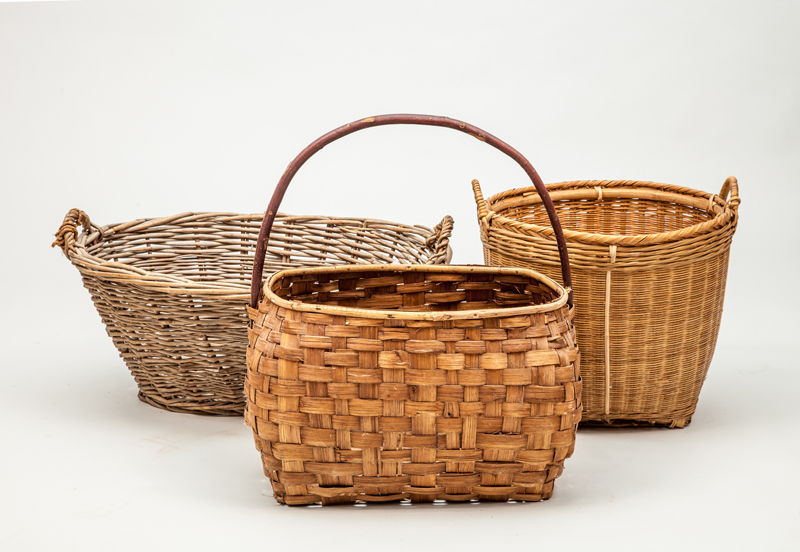 Appraisal: THREE AMERICAN WOVEN BASKETS Large two-handled basket x x in