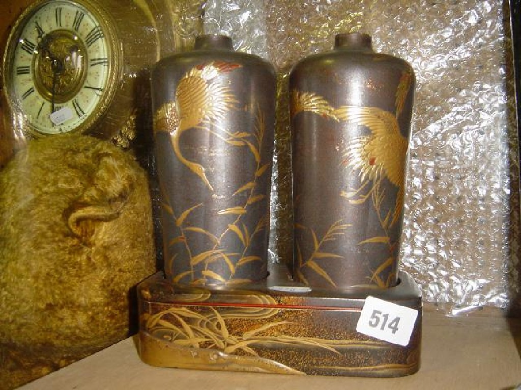 Appraisal: A pair of th century Japanese cylindrical lacquered tapering vases