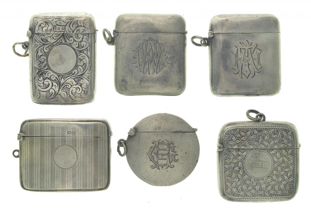 Appraisal: FOUR VICTORIAN AND EDWARD VII SILVER VESTA CASES including a