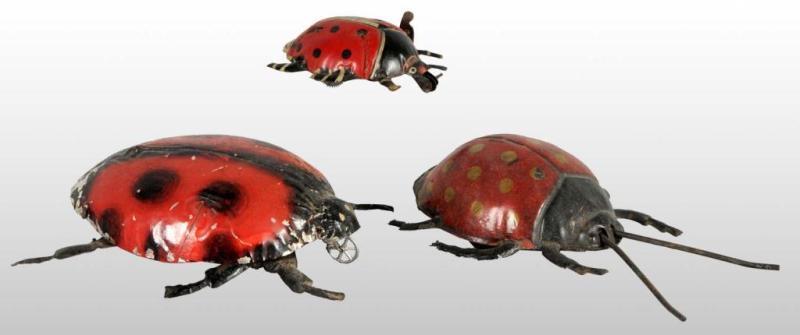 Appraisal: Lot of Tin Lady Bug Wind-Up Toys Description German Working