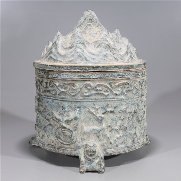 Appraisal: Large Chinese ceramic hill covered tripod censer with molded designs