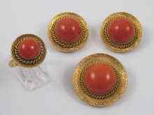 Appraisal: A suite of coral jewellery comprising ear clips brooch and