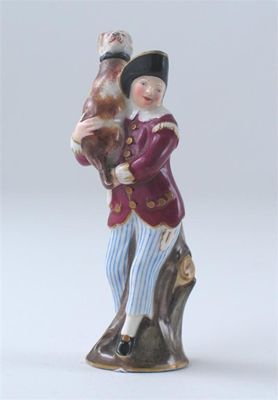 Appraisal: A Meissen scent bottle modelled as a man holding a