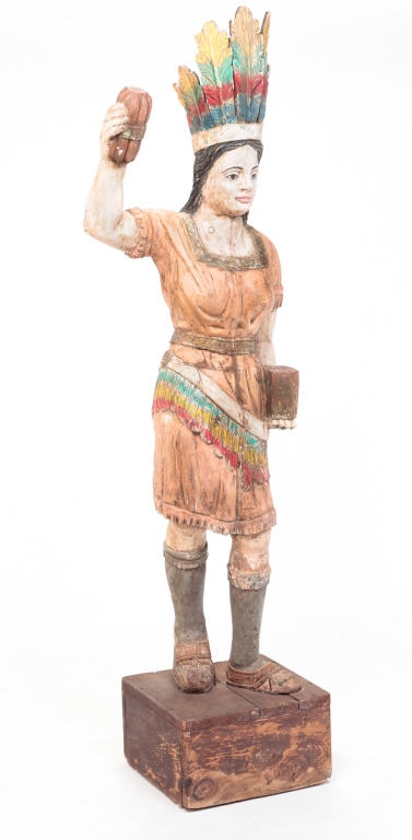 Appraisal: Second half th century hardwood Native American woman holding a