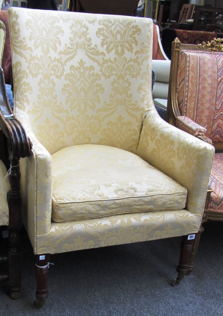 Appraisal: A Regency mahogany tub back armchair on turned supports