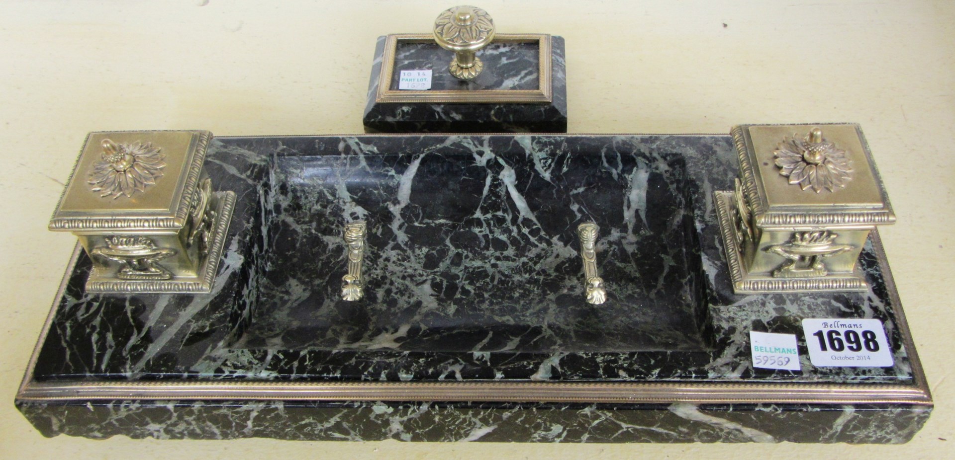 Appraisal: A continental green vein marble and ormolu mounted desk stand