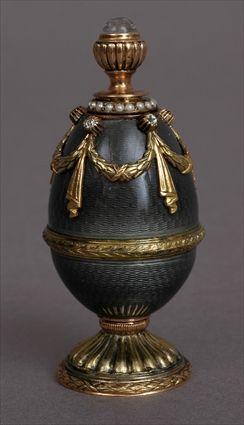 Appraisal: RUSSIAN GOLD-MOUNTED ENAMEL EGG-FORM SCENT BOTTLE AND STOPPER Impressed marks