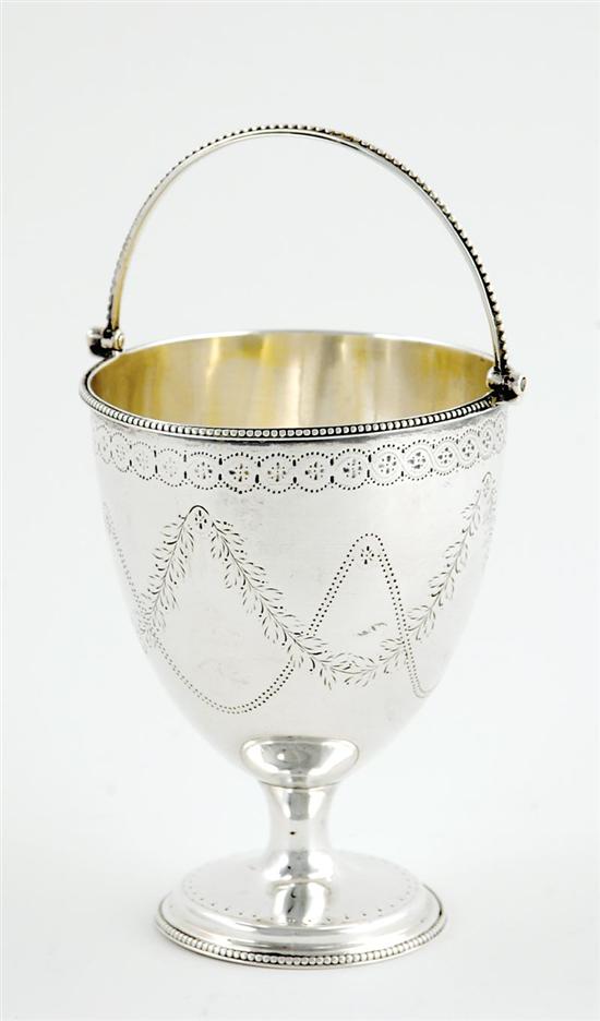 Appraisal: Georgian sterling sugar basket London dated beaded pivoting handle on