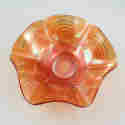 Appraisal: Carnival glass ruffled edge bowl with semi-circular waves on the