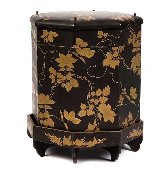 Appraisal: A Japanese lacquered occasional table with octagonal glass top height