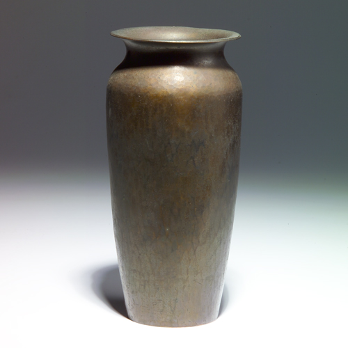 Appraisal: ROYCROFT Hammered copper baluster vase with flaring rim of heavy