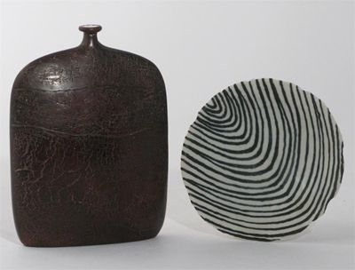 Appraisal: Peter Hayes born a raku bottle vase covered in a