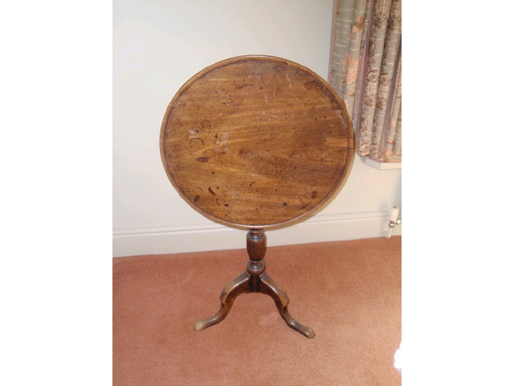 Appraisal: A George III mahogany supper table with moulded circular tilt