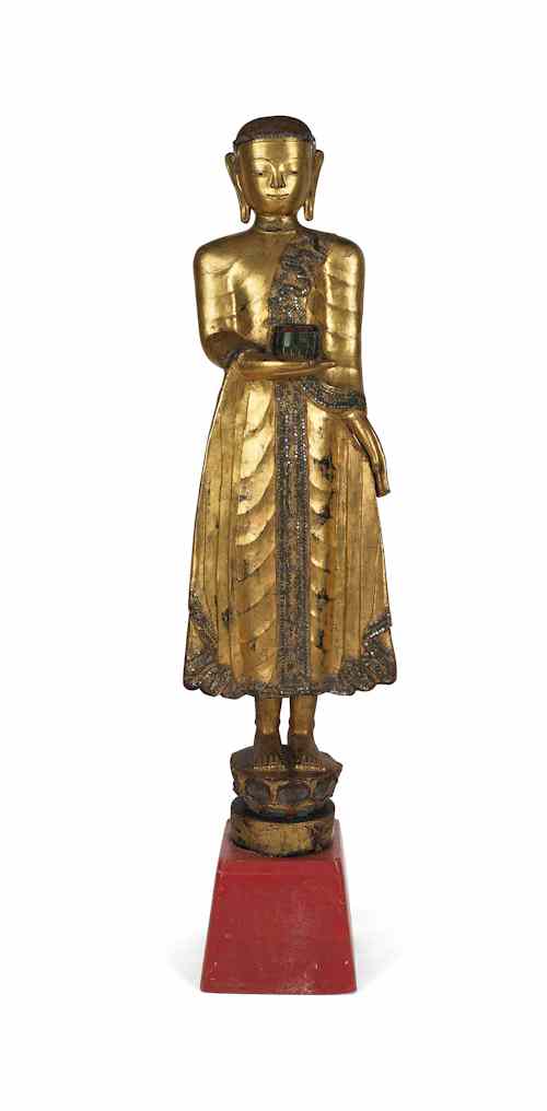 Appraisal: Thai carved and giltwood figure h