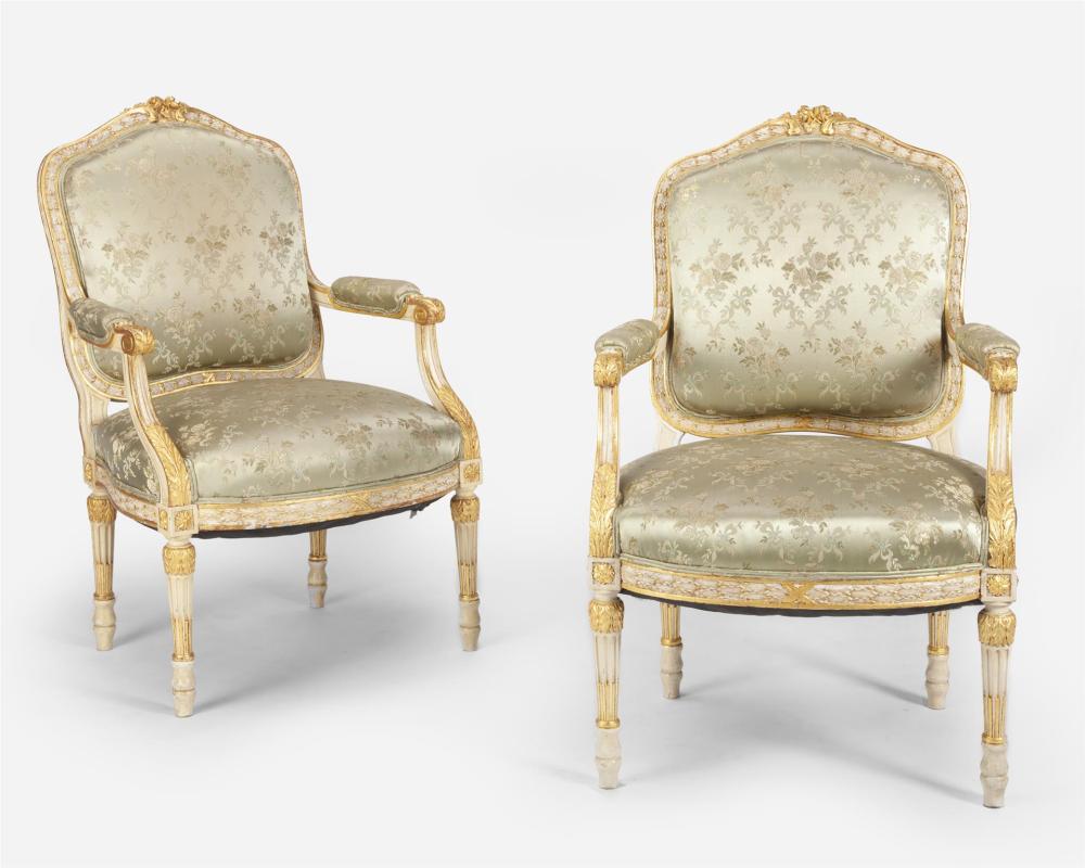 Appraisal: A pair of Louis XVI-style carved giltwood fauteuils First-half th