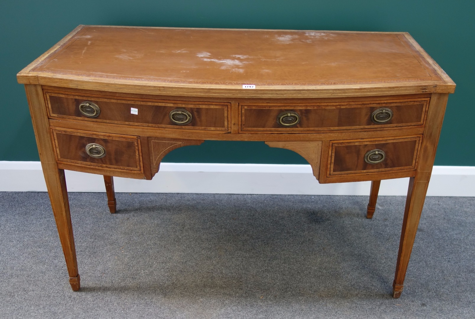 Appraisal: A th century inlaid mahogany bowfront writing table with four