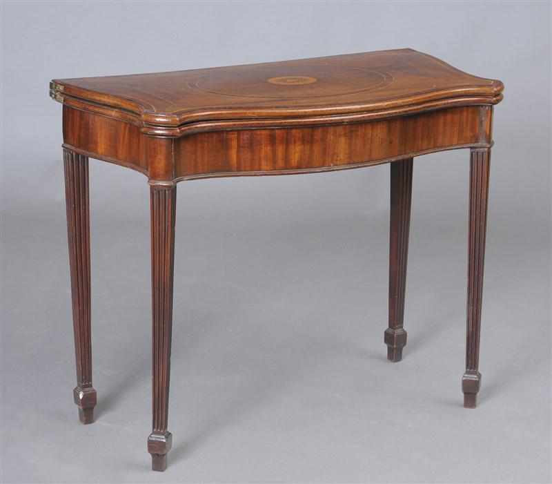 Appraisal: GEORGE III INLAID MAHOGANY SERPENTINE-FRONTED GAMES TABLE The hinged top