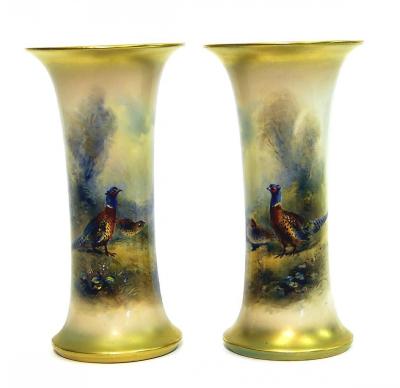 Appraisal: A PAIR OF ROYAL WORCESTER PORCELAIN VASES of waisted form