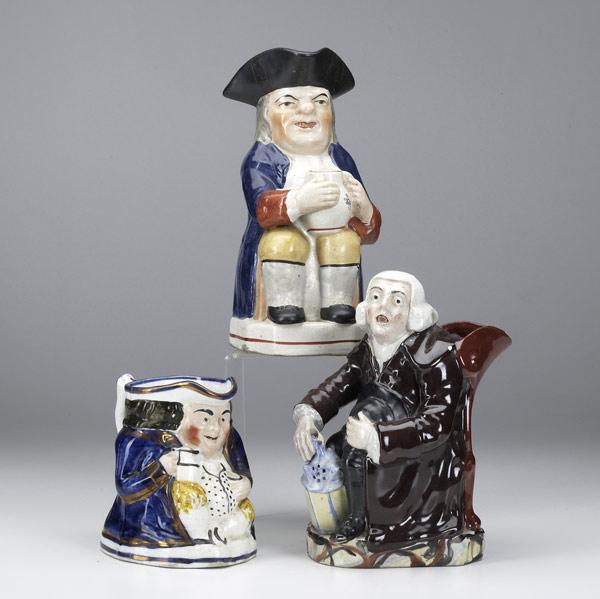 Appraisal: Three English Tobys th C Night watchman figure and two